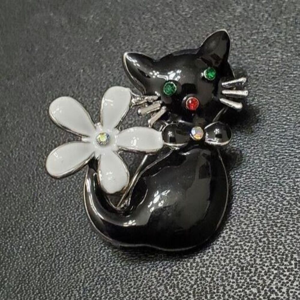 Black enamel kitty cat brooch